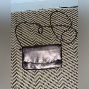 Unbranded irridecent purple/silver fold over crossbody purse